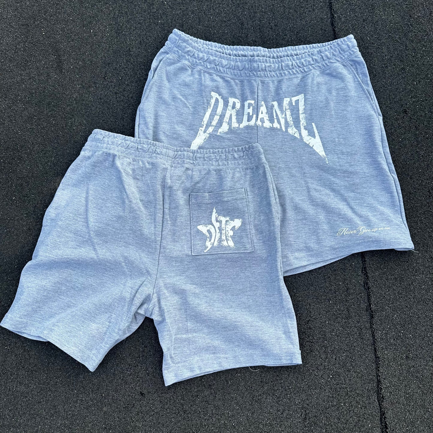 NEVER GIVE UP ON EM SHORTS